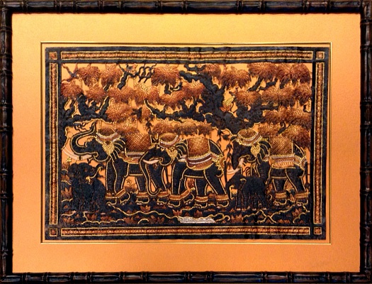Работа выполненная из кожи, оформлена с использованием канта, паспарту, стекла и деревянного багета с имитацией бамбука